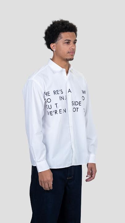 WE'RE NOT SAFE OXFORD SHIRT